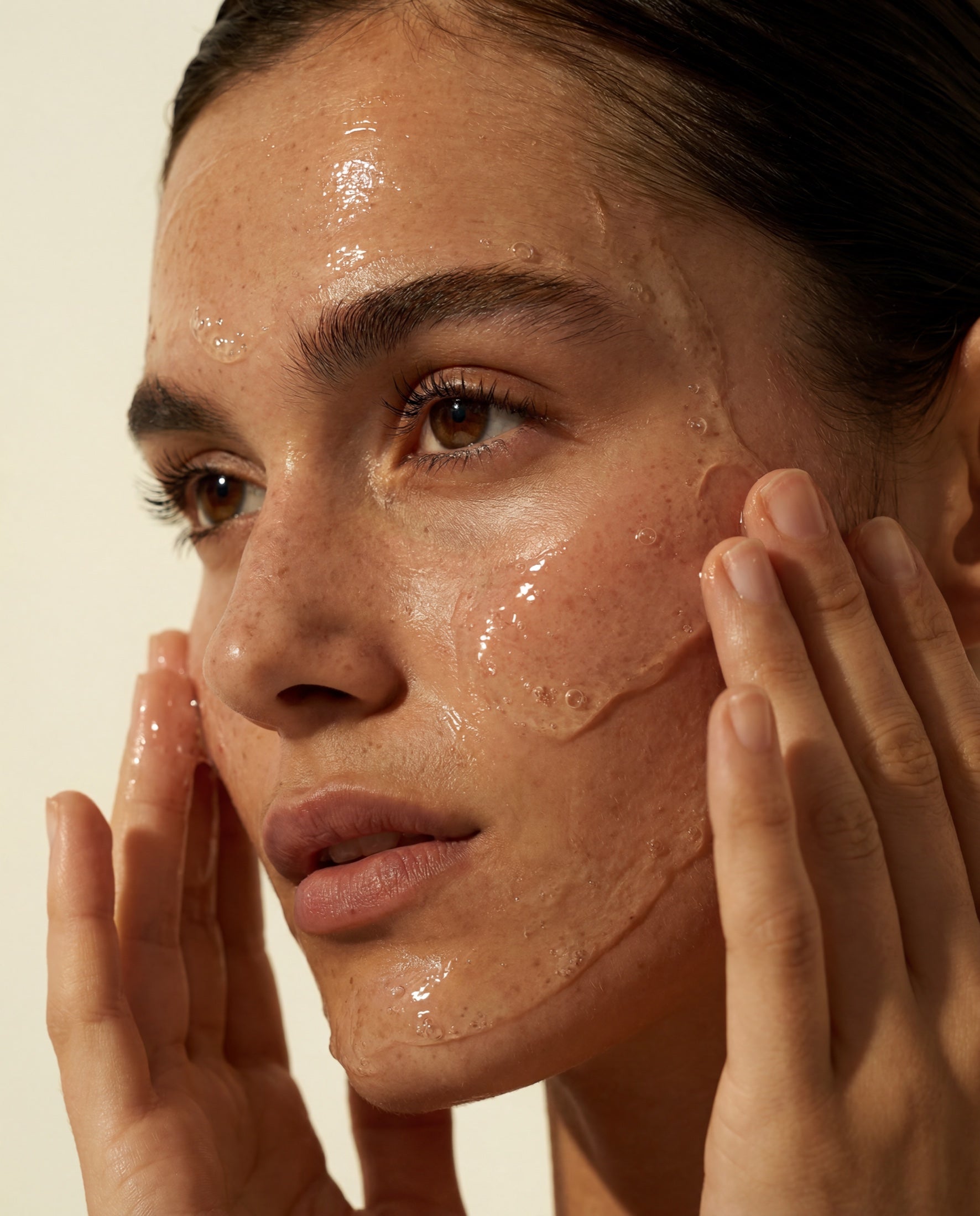 PURE applied to the face in upward arcs